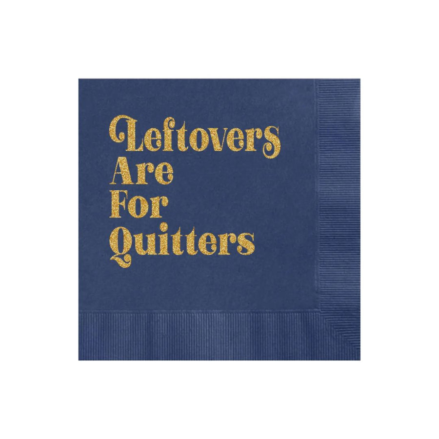 Navy blue napkin with gold text 'Leftovers Are For Quitters' on a white background