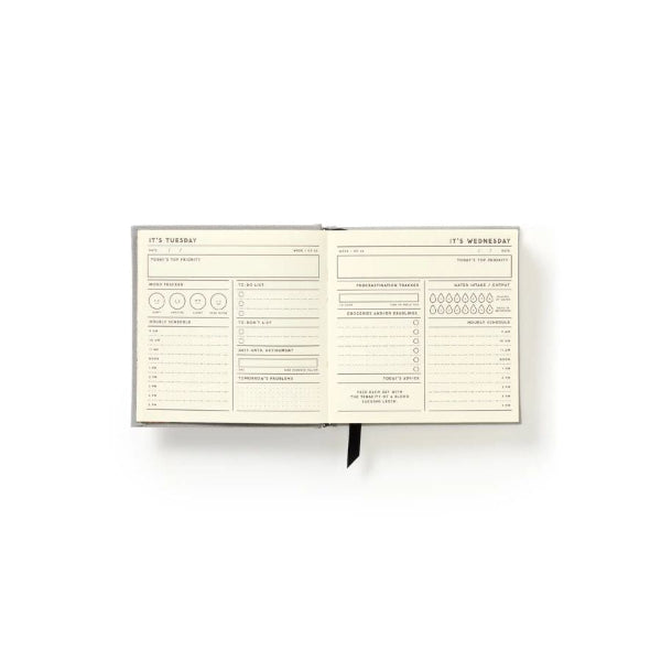 An open planner or notebook showing two interior spread pages with lined notes, checkboxes, and headings for Tuesday and Wednesday, photographed on a clean white background.