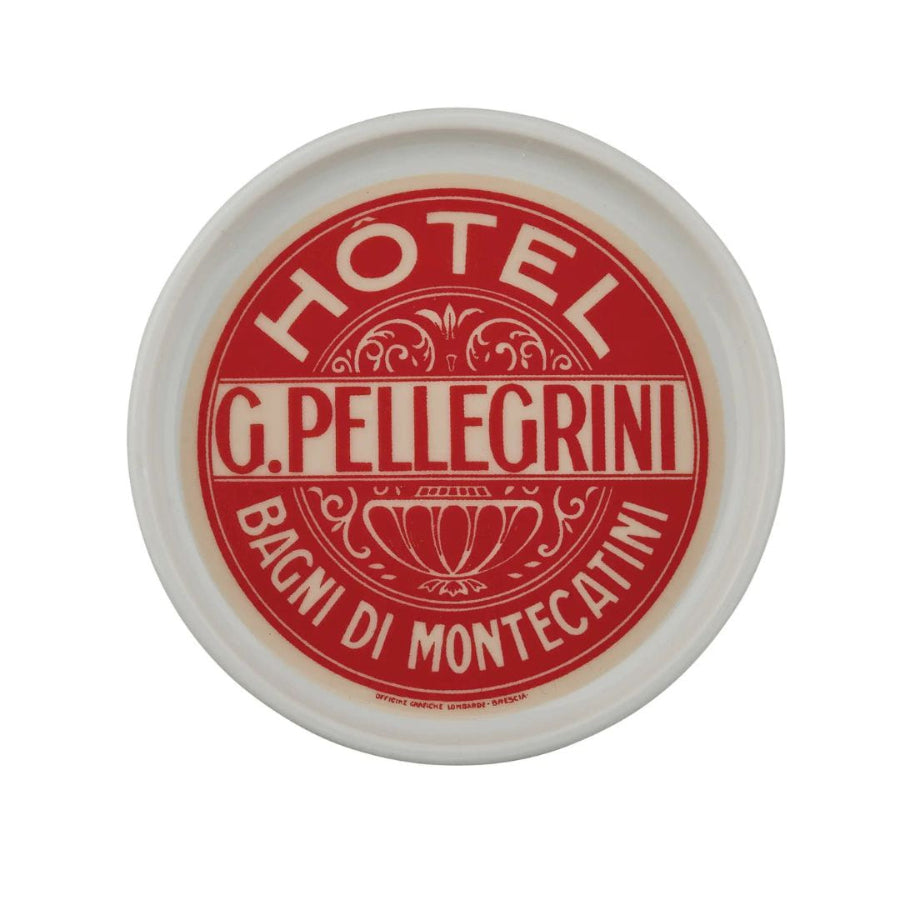 Round white coaster with red 'Hotel G. Pellegrini' logo on a white background