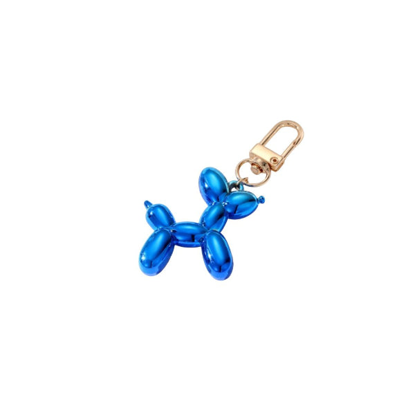 Blue balloon dog keychain with gold clasp on a white background
