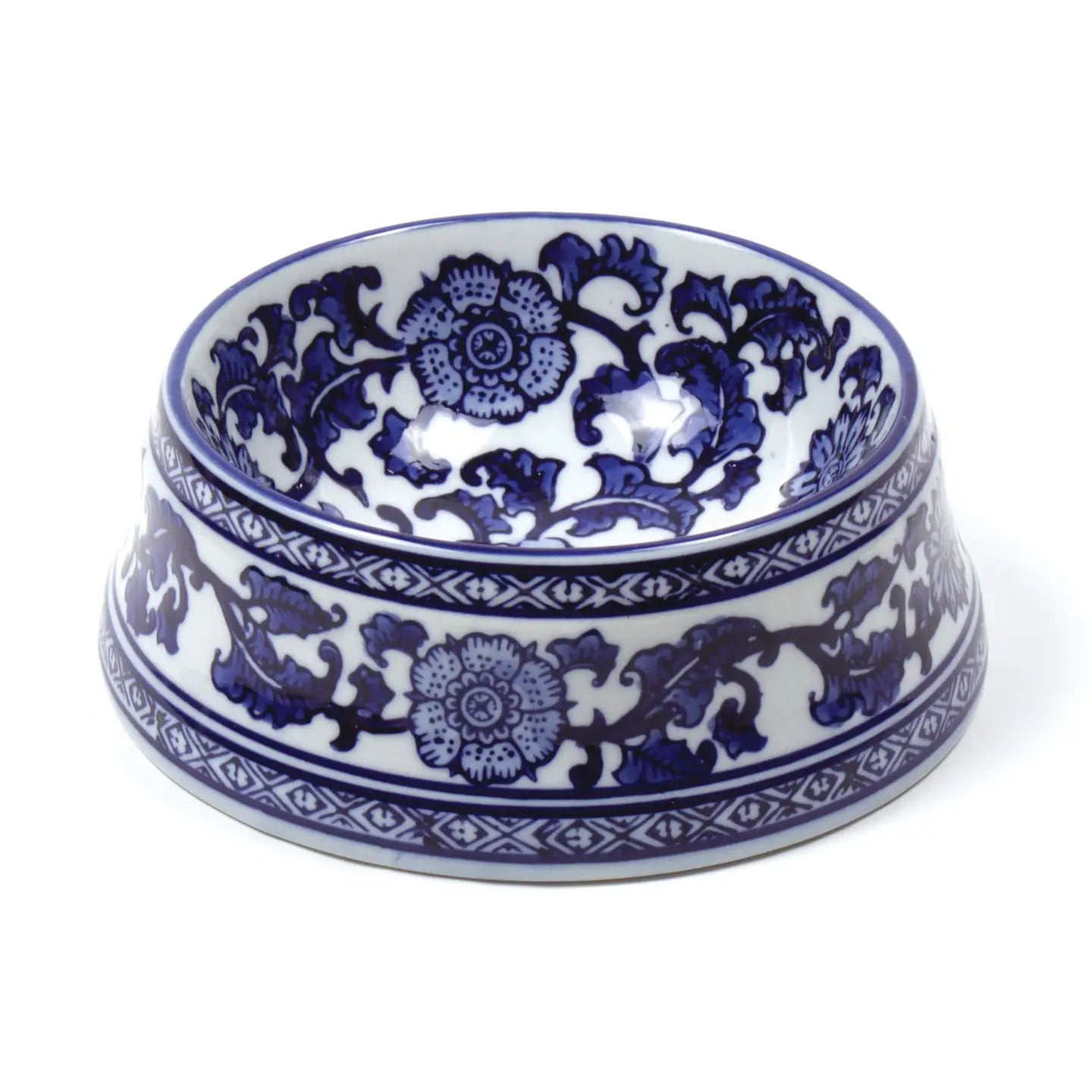 Blue and white porcelain dog bowl with intricate floral patterns on a white background