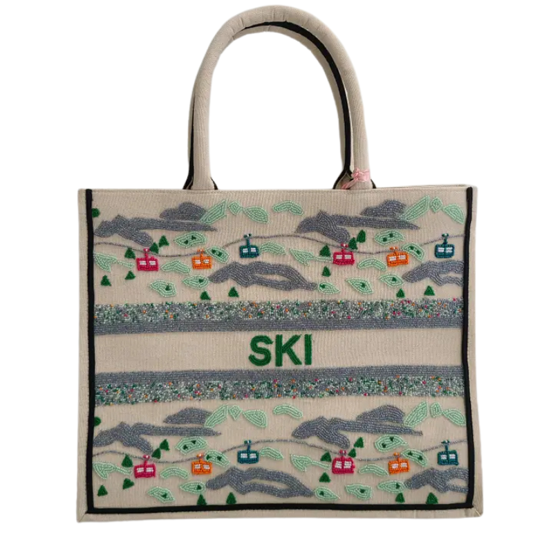 Tote bag with skiing design and 'SKI' text on a white background