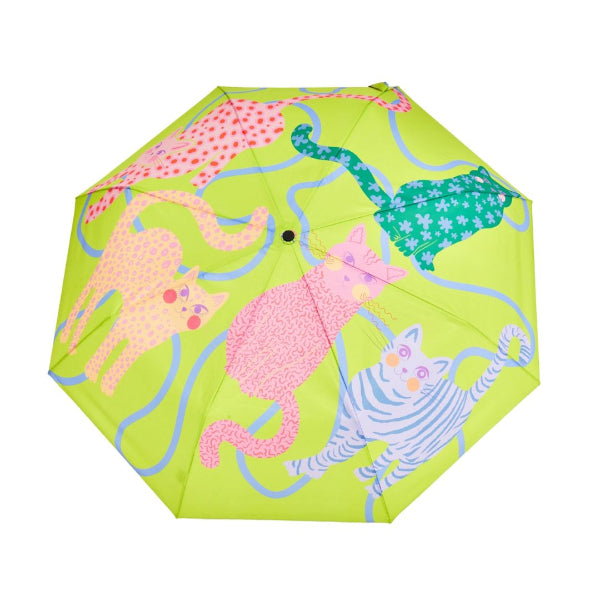 Colorful umbrella with cat designs on a white background