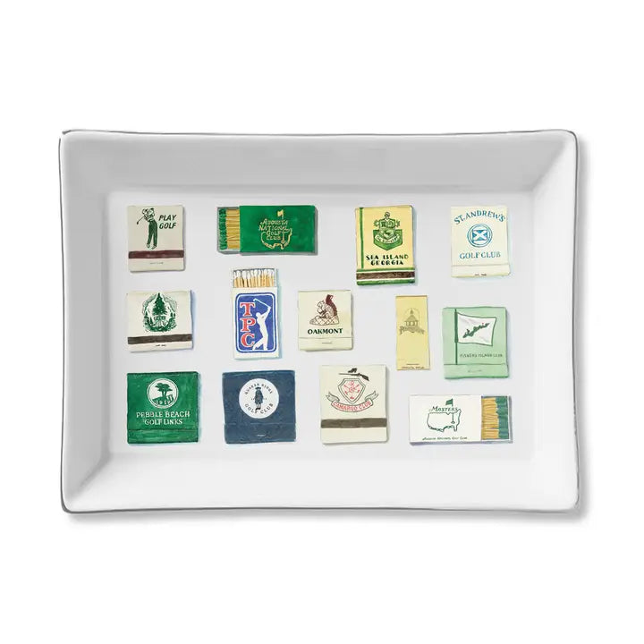 Collection of vintage Golf matchbooks printed on a white tray