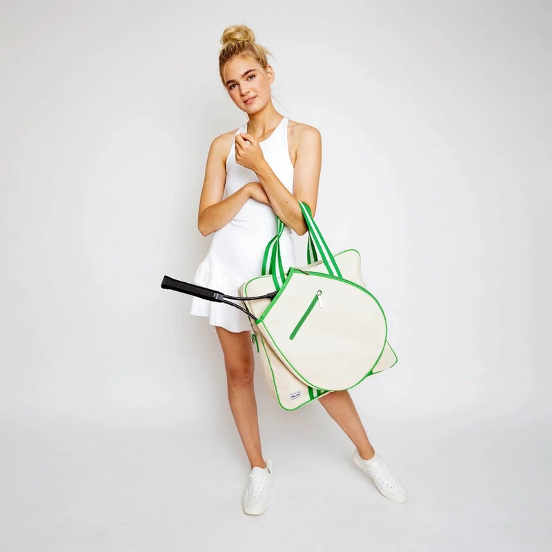 green and white tennis bag on model