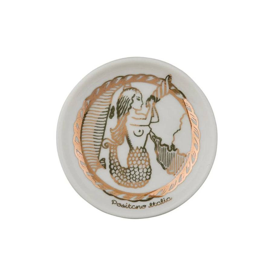 Decorative ceramic dish with mermaid design on a white background