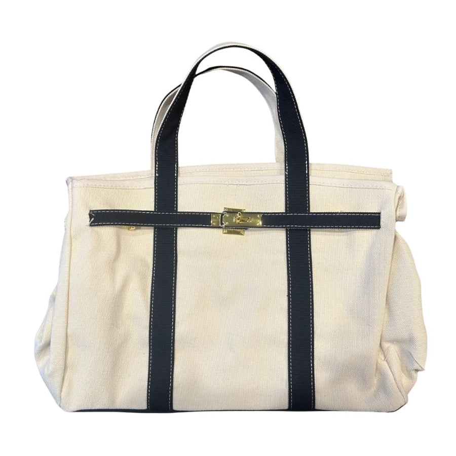 Beige bag with black straps on a white background