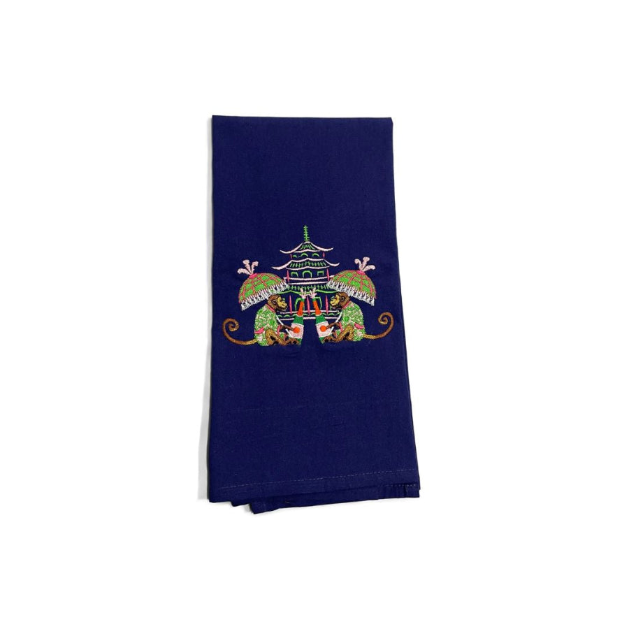 Navy blue towel with colorful pagoda design on a white background
