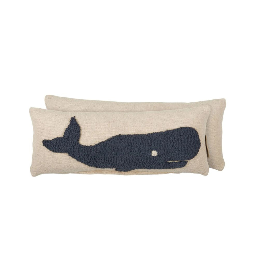 black sperm whale on white pillow 
