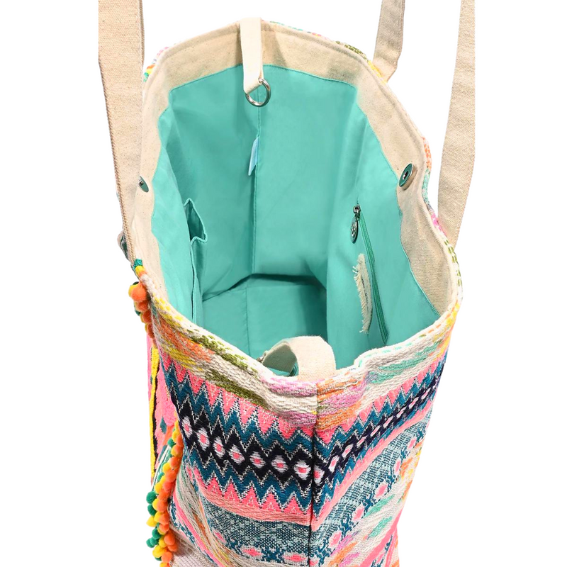 inside of colorful embellished teal tote bag