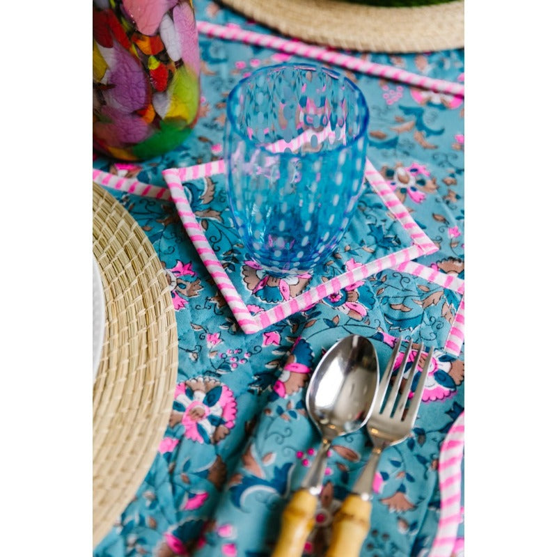 turquoise and pink coaster son table