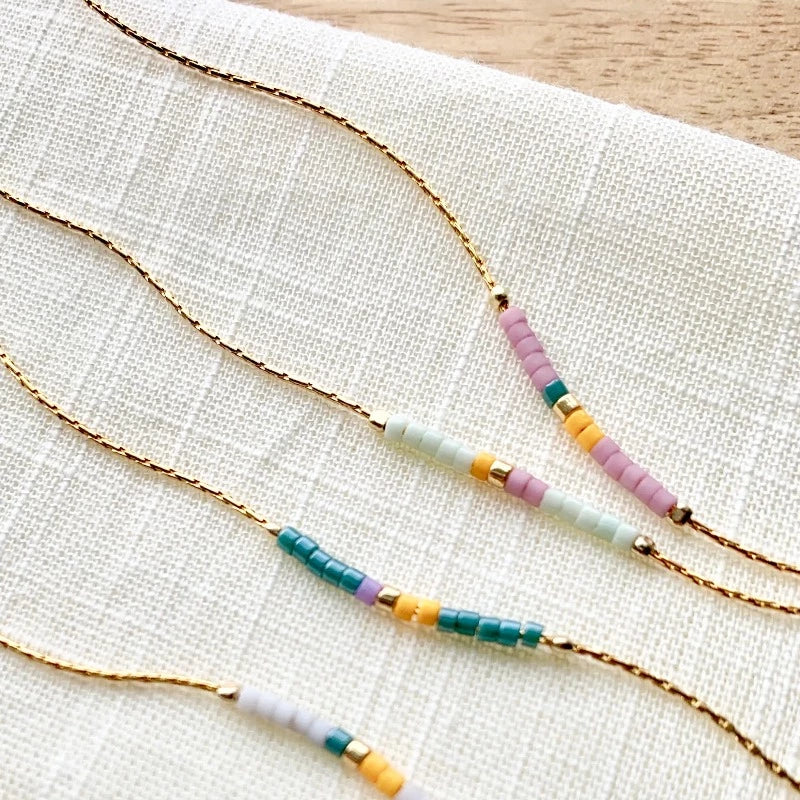 beaded gold layering necklaces