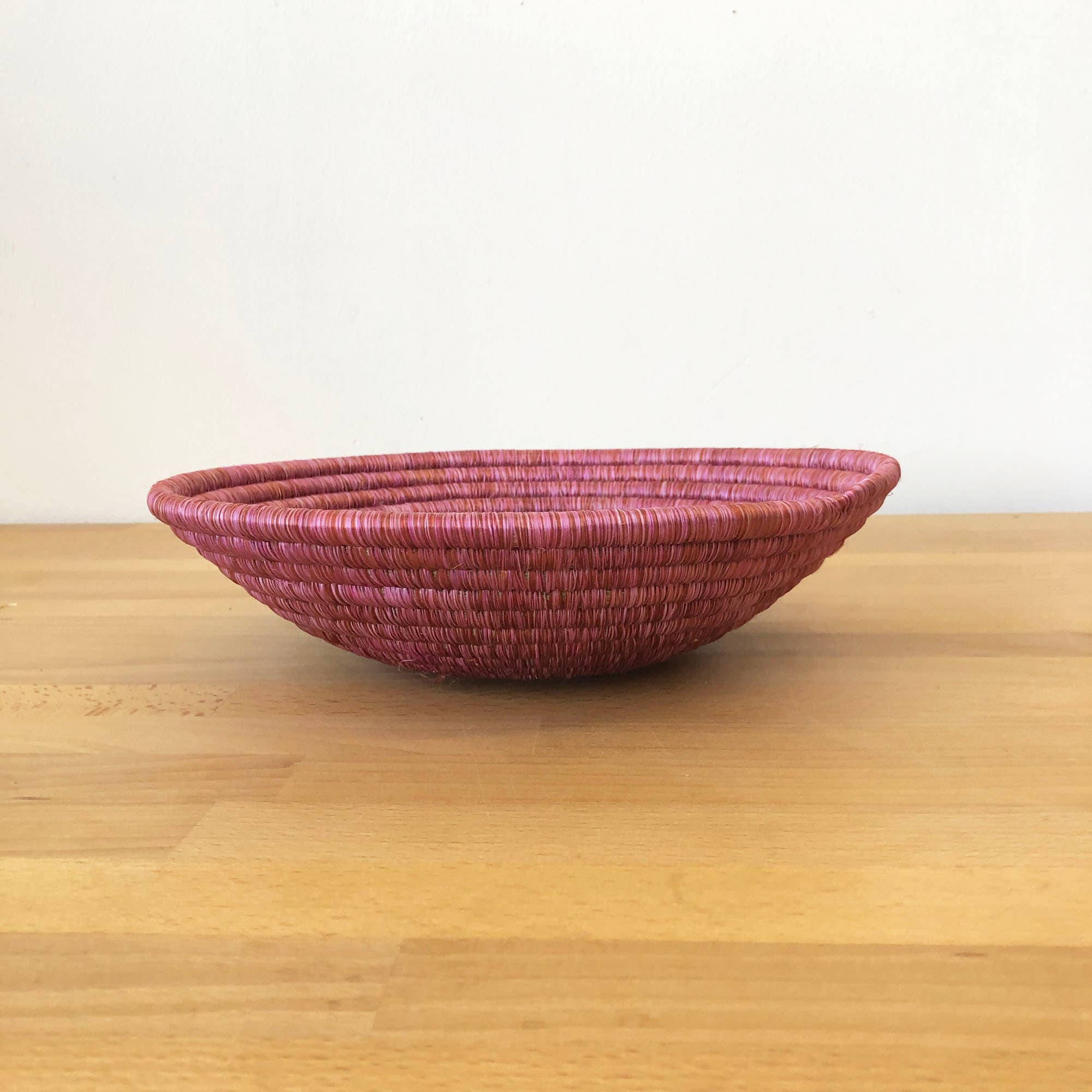 dark pink african woven basket