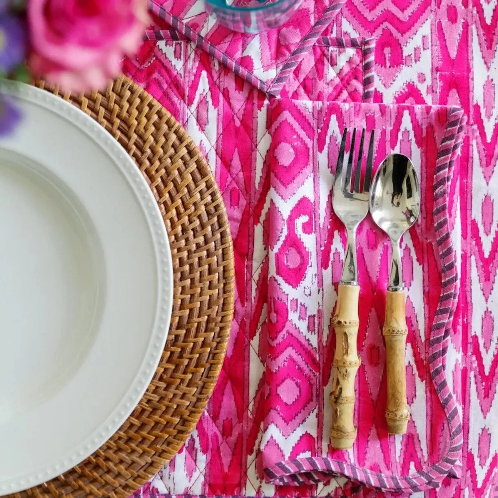 pink and white placemats and napkins